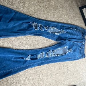 Ripped Bell Bottom Jeans